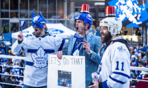 2019_Fans Pose With a Sign at the Scotiabank Arena Viewing Party Prior to Game 3 of the 2019 Stanley Cup Playoffs