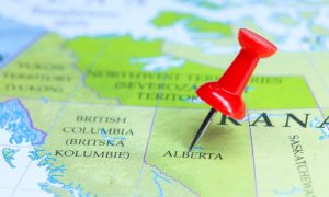 Red pushpin on Alberta map highlighting BetMGM's market expansion into Canadian province